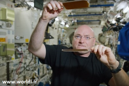 Astronaut plays ping-pong with a ball of water